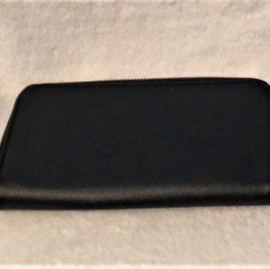 Black Wallet with a Fluffy Ball